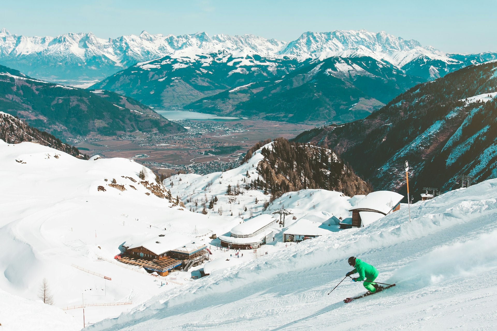 A skier on a snow-covered alpine slope